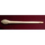 A 19TH CENTURY FLEMISH CARVED IVORY KRIS HANDLE The primitive carving in the form of a facial