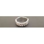 AN 18CT WHITE GOLD RING SET WITH 22 ROUND CUT DIAMONDS Diamond weight approximately 1.2cts (size L).