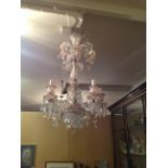A VENETIAN GLASS FIVE BRANCH CHANDELIER  With hand painted cream and gilt decoration, hung with