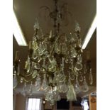 A LARGE AND IMPRESSED EARLY 20TH CENTURY FRENCH ORMOLU EIGHTEEN BRANCH TWELVE LIGHT CHANDELIER  Hung