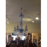A FRENCH BLUE CUT GLASS FIVE BRANCH CHANDELIER  Hung with clear glass prisms.