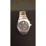 SEIKO, KINETIC, A STAINLESS STEEL MID SIZE WRISTWATCH Having a date window at 3 o'clock and a