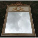A 19TH CENTURY FRENCH MIRROR The grey and gilt frame crested with a floral cartouche, above a