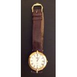 RAYMOND WEIL, AN 18CT GOLD PLATED MID SIZE WRISTWATCH Having a white enamel dial, black Roman