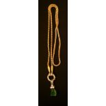 A FINE UNMARKED HIGH CARAT GOLD, DIAMOND AND JADE BUDDHA PENDANT Suspended from an unmarked high