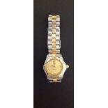 TAG HEUER, PROFESSIONAL, A STAINLESS STEEL AND GOLD LADIES' BRACELET WATCH Having a champagne tone