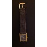 RAYMOND WEIL, A LADIES' GOLD PLATED WATCH With a square black dial, on a faux snake skin leather