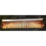 A LATE 20TH CENTURY SILVER AND TORTOISESHELL COMB Initialled 'D.H.G.'. (14cm l x 4cm w) (5246/