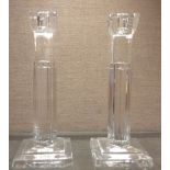 WATERFORD, A PAIR OF ART DECO STYLE CRYSTAL GLASS CANDLESTICKS Having geometric stepped designed