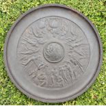 A 19TH CENTURY FRENCH CAST IRON CHARGER With Neoclassical embossed design of musicians, gladiators