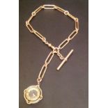 A 9CT GOLD ALBERT CHAIN With T bar and compass fob, each link marked '375'. (38.5cm)  (5626/31909/