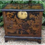 AN 18TH CENTURY DOWRY CHEST ON STAND With later black lacquered decoration, in the form of figures