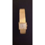 TUDOR, AN 18CT GOLD LADIES' WRISTWATCH Having a rectangular face, with horizontal bar markers and 17