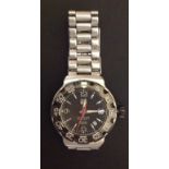 TAG HEUER, FORMULA 1, A STAINLESS STEEL GENTLEMEN'S WRISTWATCH Having a black dial, calendar