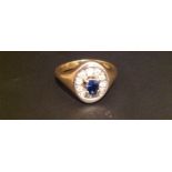 A HEAVY HALLMARKED 18CT GOLD, SAPPHIRE AND DIAMOND GENTLEMEN'S RING The oval bezel with a central