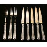 A PART SET OF CONTINENTAL SILVER FRUIT KNIVES AND FORKS The forks having three gilded prongs and