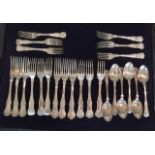 A COLLECTION OF ENGLISH HALLMARKED SILVER CUTLERY In Kings pattern, to include eighteen forks and