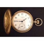 J.W. BENSON, LONDON, A HALLMARKED 9CT GOLD POCKET WATCH The plain gold case enclosing crown wind