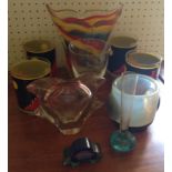 THREE VARIOUS STUDIO GLASS VASES To include two of compressed and everted form, along with a