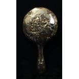 AN EDWARDIAN HALLMARKED SILVER HAND MIRROR Having a decorative Art Nouveau style border and a