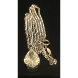 A HALLMARKED 18CT WHITE GOLD PEAR CUT DIAMOND PENDANT Claw set with a fixed bale, suspended from