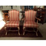 A PAIR OF GEORGE I DESIGN ARMCHAIRS With upholstered seats and backs, the gilt frames with scrolling