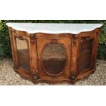 A GOOD VICTORIAN FIGURED WALNUT SERPENTINE MARBLE TOPPED CREDENZA With three glazed doors, raised on
