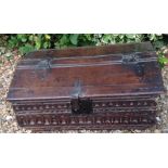 A 17TH CENTURY OAK AND IRON BOUND BIBLE BOX With chip carved decoration. (approx 26cm x 63cm x