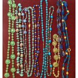 A COLLECTION OF MURANO GLASS BEAD NECKLACES.