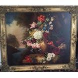 A 19TH CENTURY GILT FRAMED OIL ON CANVAS Still life, a vase of tulips, primroses and morning