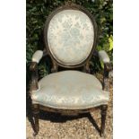 AN EARLY 19TH CENTURY FRENCH CARVED AND PAINTED OPEN ARMCHAIR Raised on fluted legs.