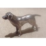 A 20TH CENTURY HALLMARKED SILVER ANIMALIER FIGURE OF A DOG With long ears and a pointed tail,