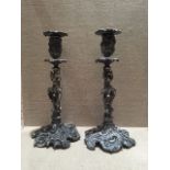 ELKINGTON & CO., A PAIR OF HEAVY 19TH CENTURY SILVER PLATED CANDLESTICKS Of Rococo design, stamped