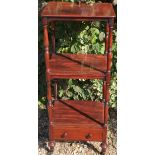 A VICTORIAN MAHOGANY THREE TIER WHATNOT With a single drawer, raised on a bulbous foot terminating