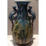 C.H. BRANNAM, BY FREDERICK BARON, AN EARLY 20TH CENTURY ART POTTERY VASE Having a baluster body with