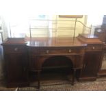 A 19TH CENTURY MAHOGANY SIDEBOARD With a brass galleried back and two knife boxes, over three