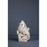 A LARGE 18th CENTURY, PALE CELADON JADE CARVING OF A PHOENIX Carved in the form of a phoenix