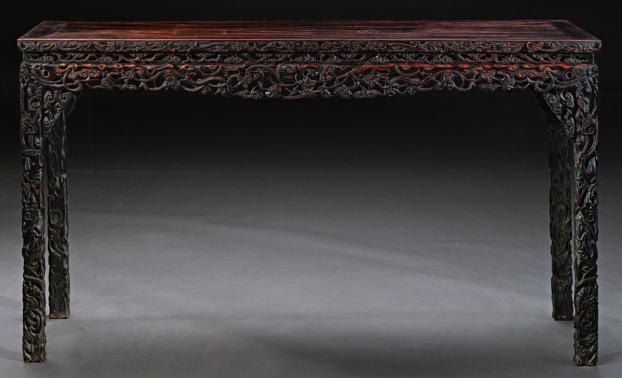 A 19th CENTURY CHINESE ZITAN TABLE  A single floating panel within standard mortise and tenon