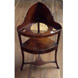 A LATE GEORGIAN MAHOGANY CORNER WASHSTAND  With boxwood stringing inlay, two faux drawers and one