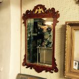 TWO 18TH CENTURY DESIGN FIGURED WALNUT AND PARCEL GILT MIRRORS Crested with eagles. (60cm x 100cm)