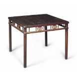 A 19TH CENTURY CHINESE JICHIMU, HONGMU AND LACQUERED HARDWOOD CENTRE TABLE The pierced frieze with