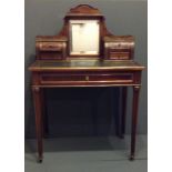 A 19TH CENTURY MAHOGANY AND BRASS BONHEUR DU JOUR LADIES' WRITING DESK Having a central mirror, with