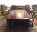 AN EARLY VICTORIAN CUBAN MAHOGANY EXTENDING DINING TABLE Complete with one extra leaf, raised on