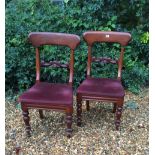 A PAIR OF EARLY VICTORIAN MAHOGANY DINING CHAIRS With carved central back rails.