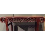 A LATE 19TH CENTURY CHINESE ROSEWOOD AND BURR ELM ALTAR TABLE Having scrolled ends and a carved