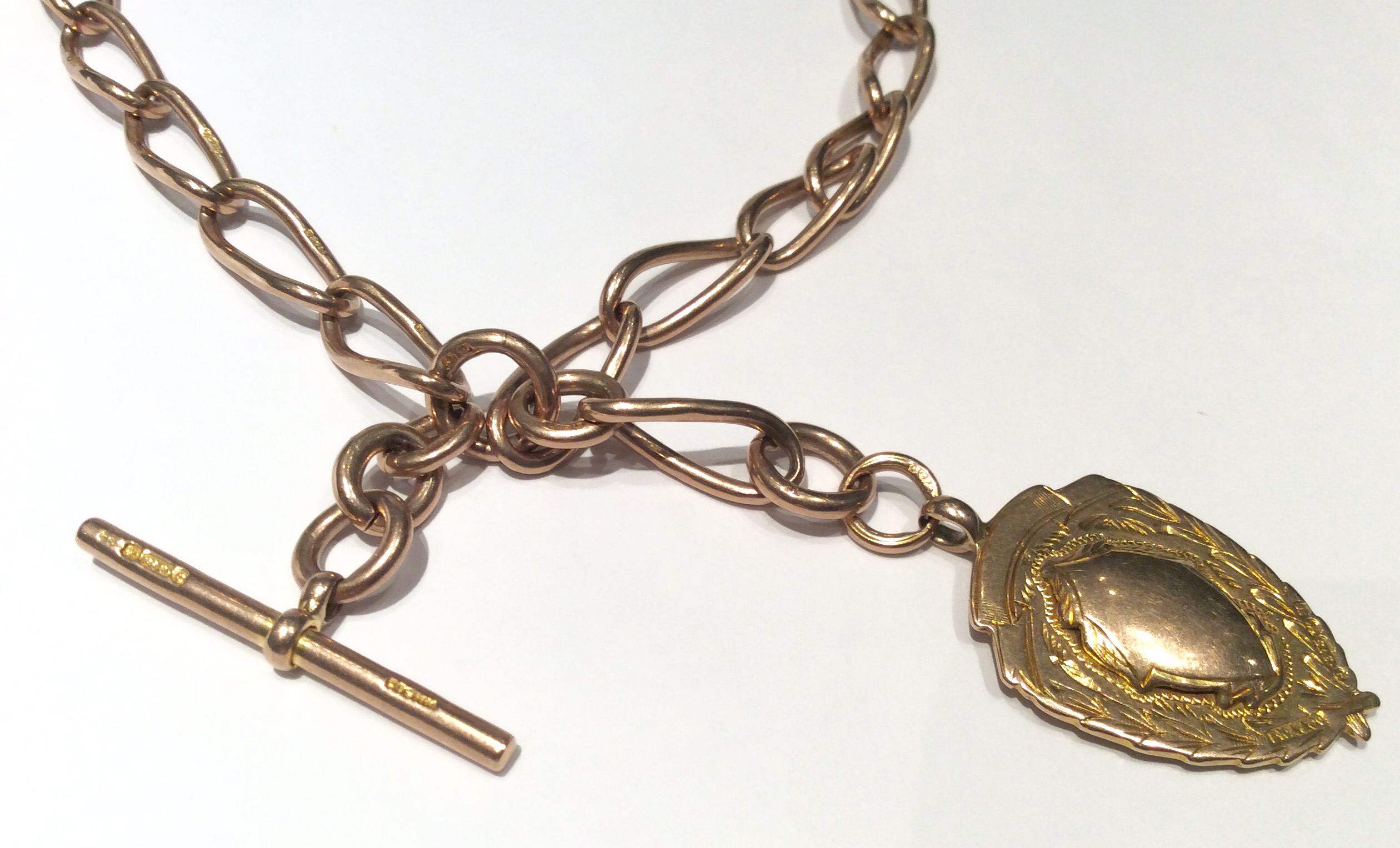 AN EARLY 20TH CENTURY HALLMARKED 9CT ROSE GOLD FOB CHAIN With T bar, dog clips and an unmarked - Image 2 of 2