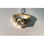 A HEAVY HALLMARKED 14CT GOLD AND DIAMOND SOLITAIRE RING The brilliant cut diamond claw set to an