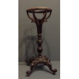 A 19TH CENTURY INDIAN PADOUK JARDINIÈRE STAND Having a turned central column, carved with flutes