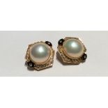 A PAIR OF 18CT GOLD, MABÉ PEARL AND DIAMOND CLIP-ON EARRINGS Each earring designed with a central