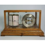 Oak Cased Barograph with Silvered Subsidiary Dial telling Weather Change by Negretti and Zambra,